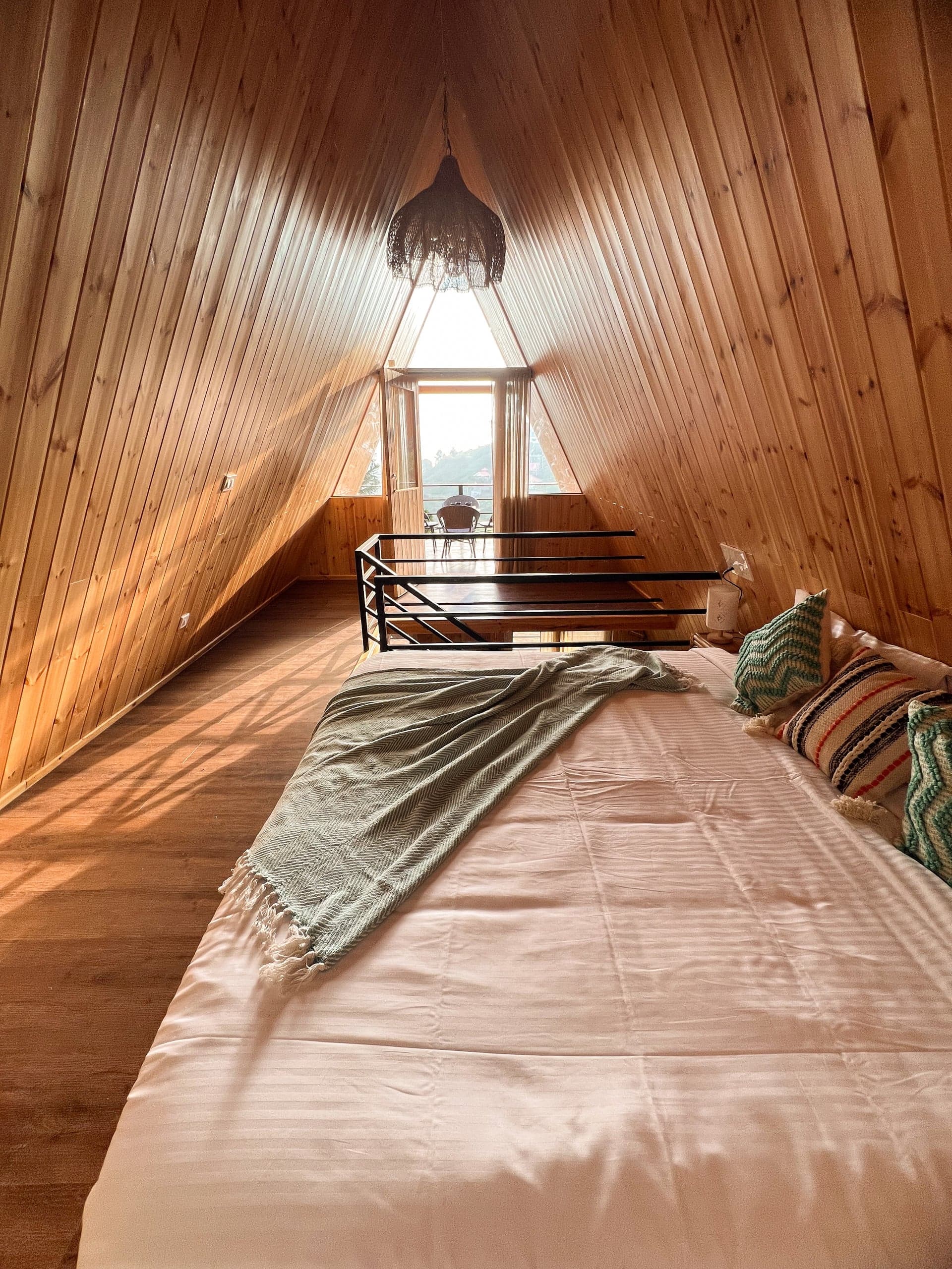 Loft bed under the pitched roof